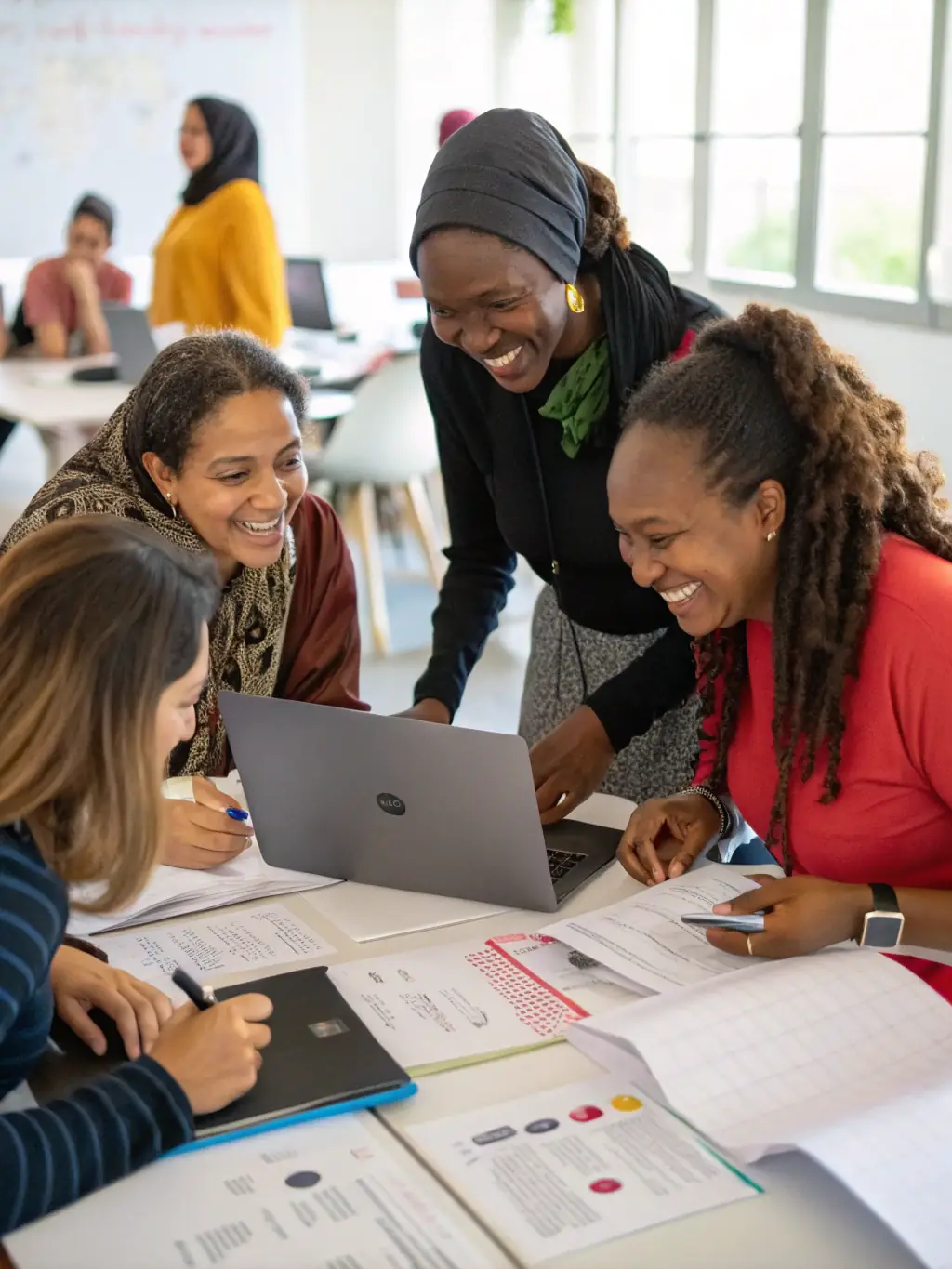 A diverse group of women participating in a SheForge workshop, collaborating on business strategies and networking. The atmosphere should be supportive and empowering.